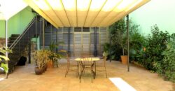 Exclusiva planta principal con jardín privado en Eixample Derecho